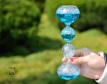 Sablier en verre avec liquide coloré, outil de mesure du temps