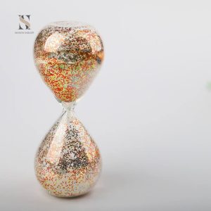 Accessoire de décoration : Sablier avec paillettes brillantes